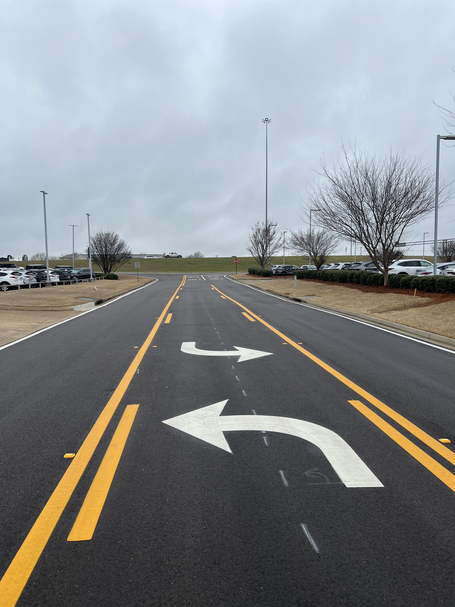 Thermoplastic turn arrows and U-turn marking on road in Ridgeland Mississippi