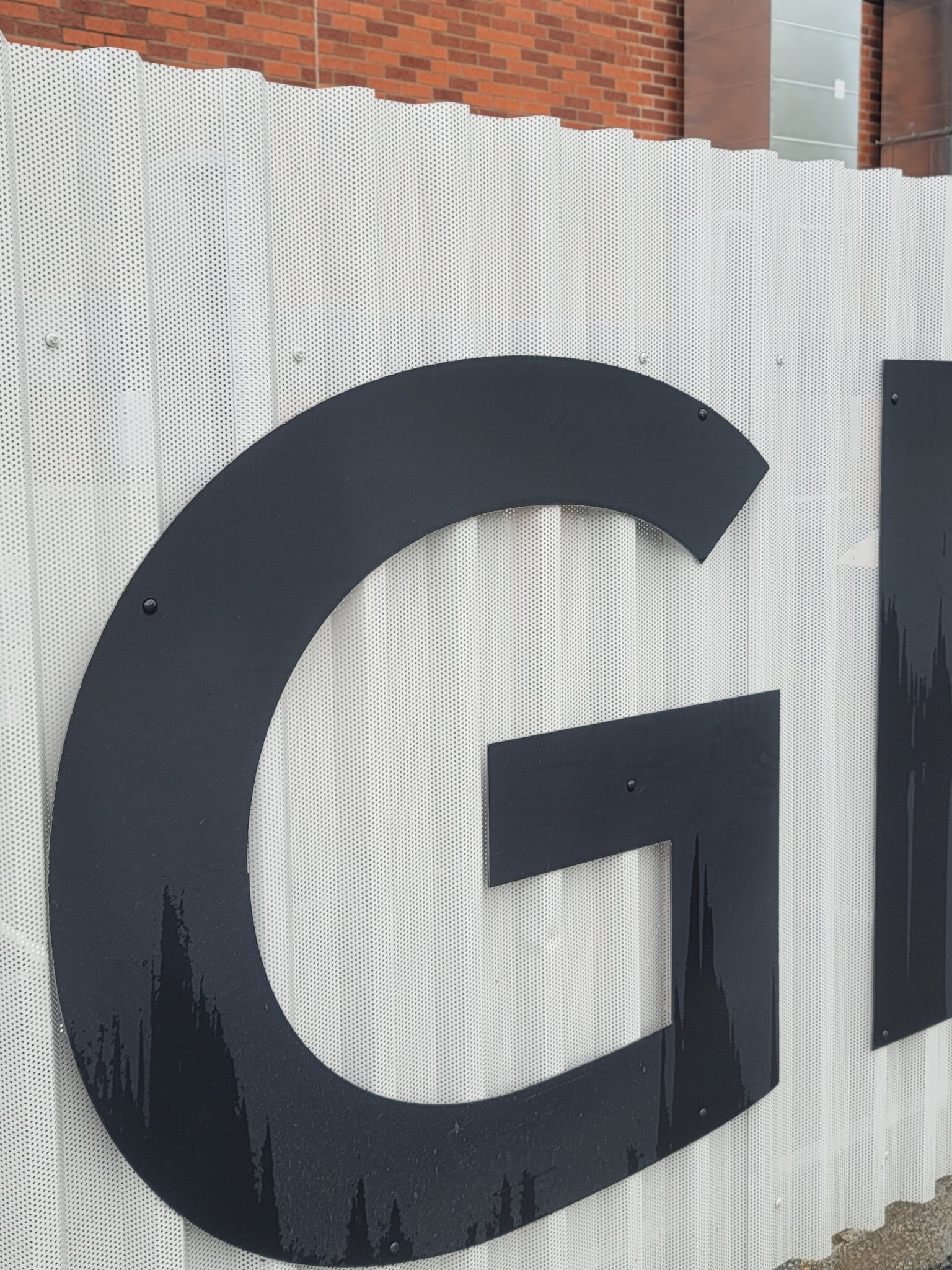 Security fencing around school equipment near Fayetteville Arkansas