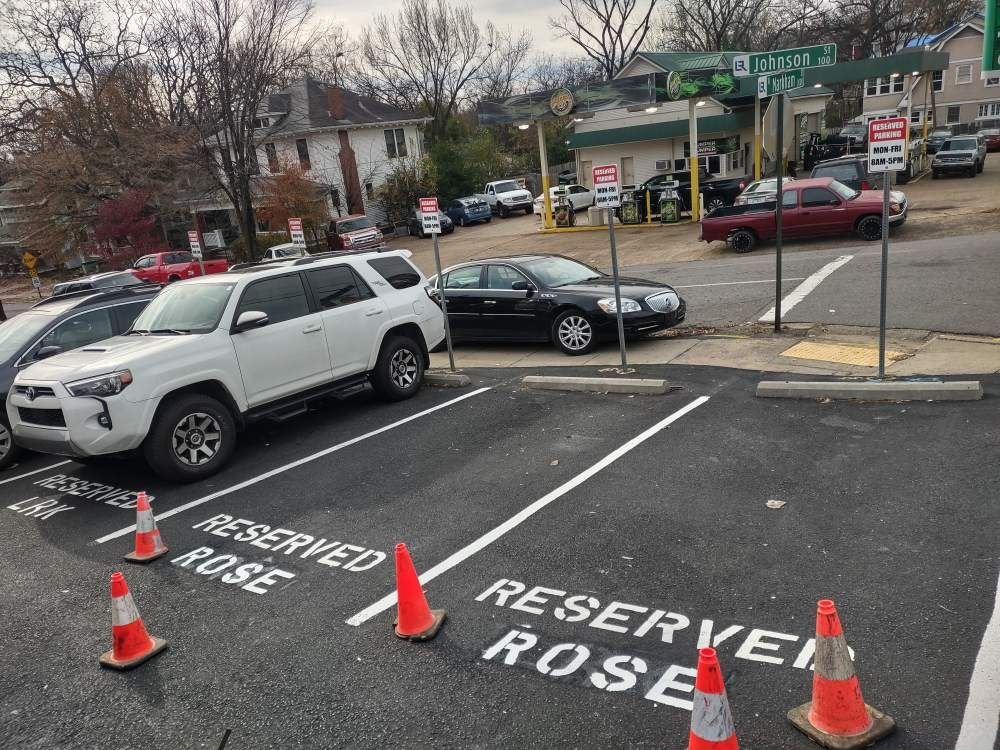 Parking lot signage installation on Markham St - Little Rock AR